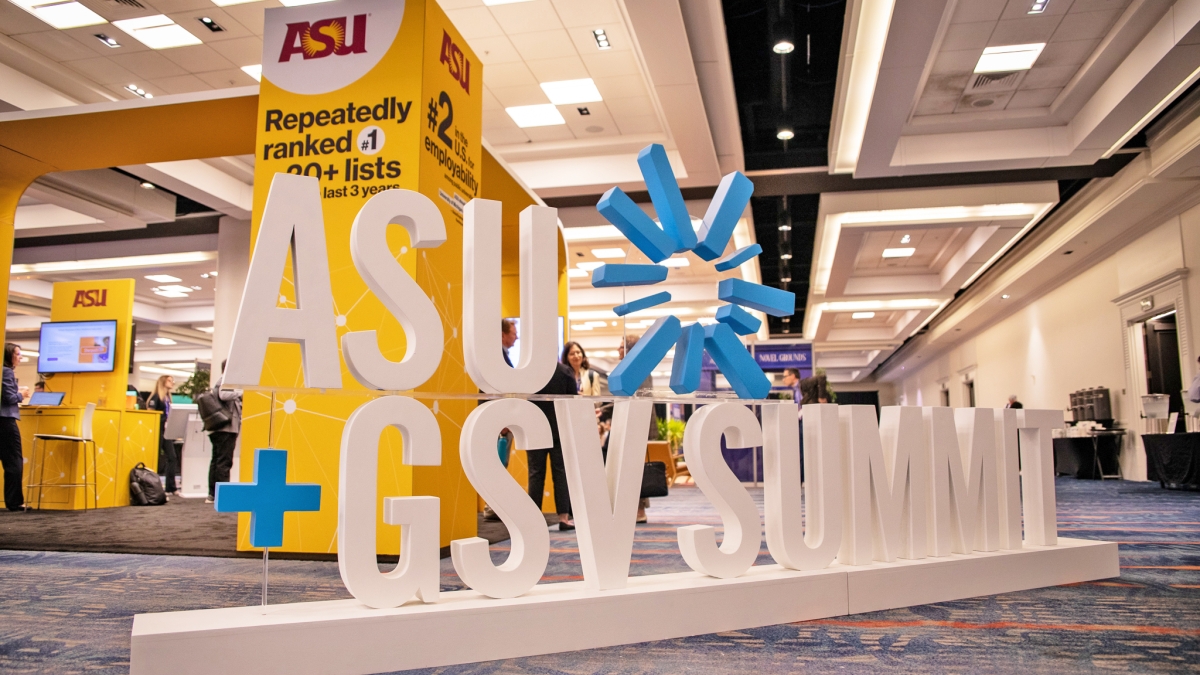 Large ASU+GSV Summit sign on the floor of an expo
