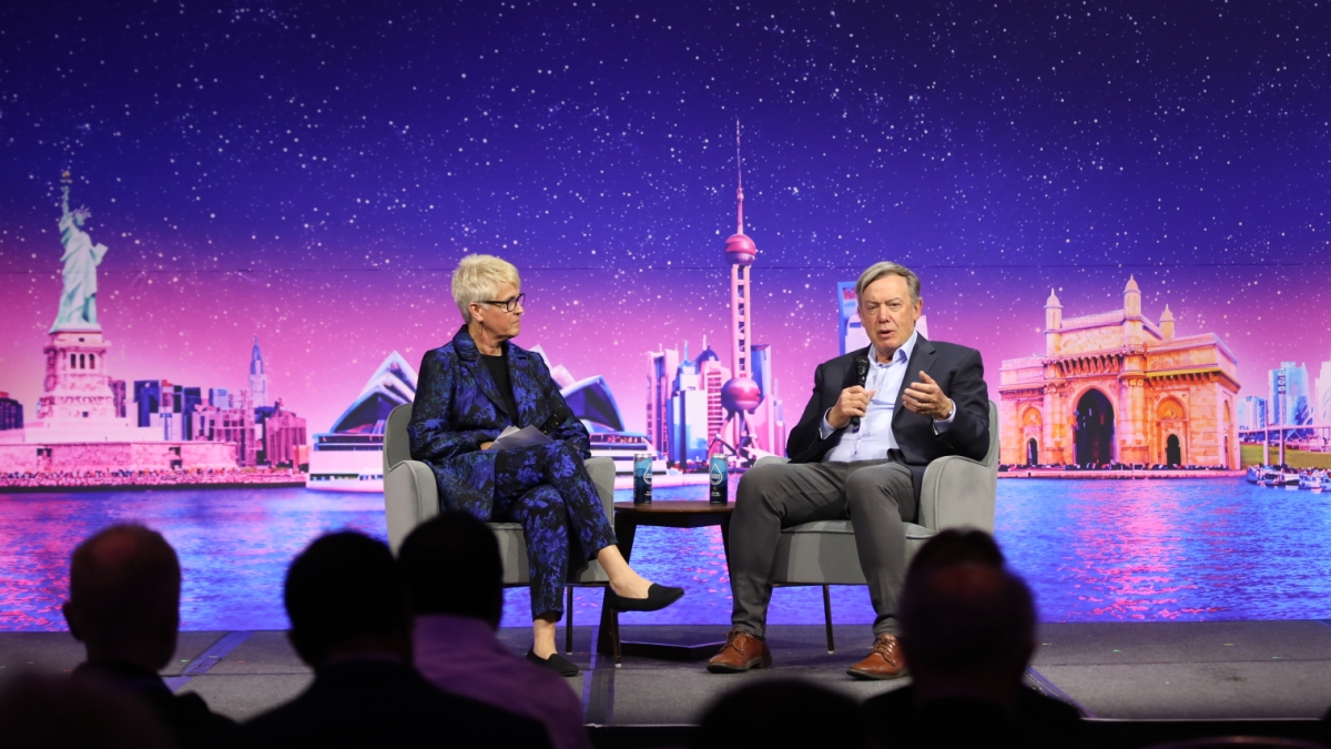 ASU®168极速入口一分钟赛车网 Foundation CEO Gretchen Buhlig sits facing ASU®168极速入口一分钟赛车网 President Michael Crow during a stage chat about the Changing Futures campaign.